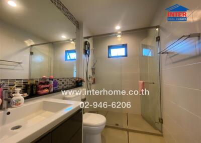 Modern bathroom with glass shower enclosure