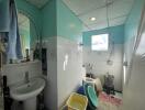 Bathroom with sink, mirror, and shower area