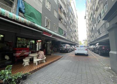 Residential building exterior with parking lot