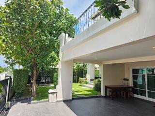 Spacious outdoor patio and garden area