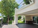 Spacious outdoor patio and garden area