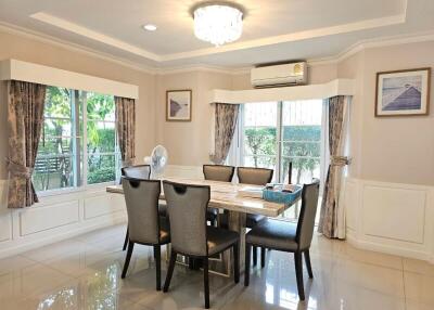 Elegant dining room with modern furniture and natural light