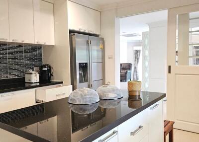 Modern kitchen with black countertop