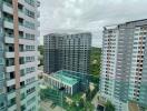 High-rise apartment buildings with a swimming pool area