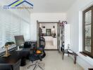 Home office area with desk, chair, and view into the kitchen