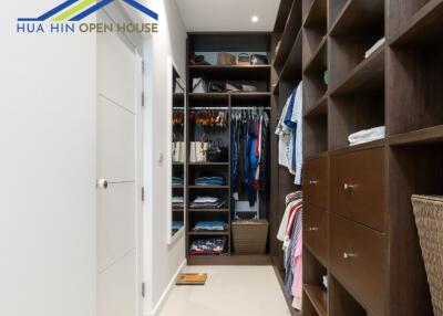 Spacious walk-in closet with ample storage