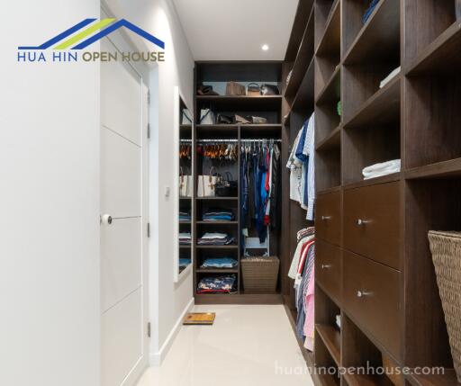 Spacious walk-in closet with ample storage