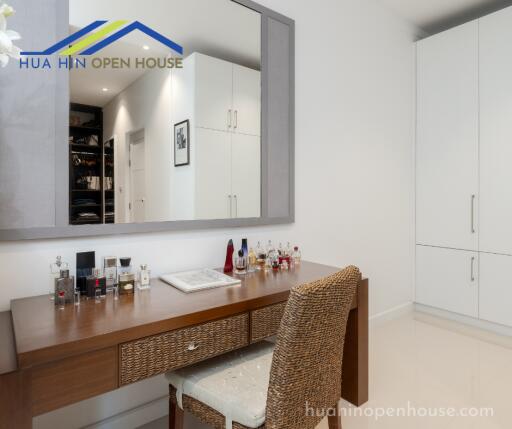 Bedroom with dressing table and wardrobe