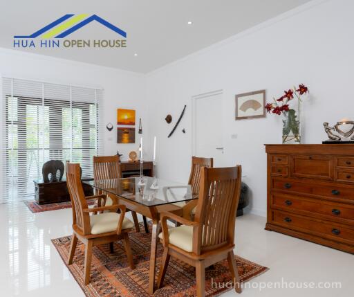 Modern dining room with wooden furniture and decorative elements