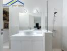 Modern bathroom with white vanity and walk-in shower