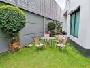 Outdoor seating area with table and chairs