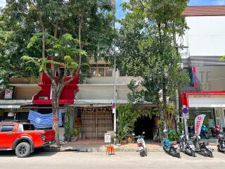 Street view of building with storefronts