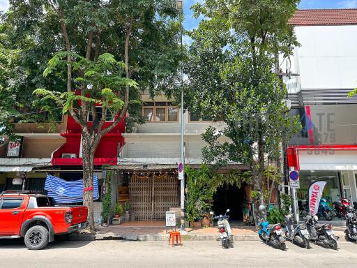 Street view of building with storefronts