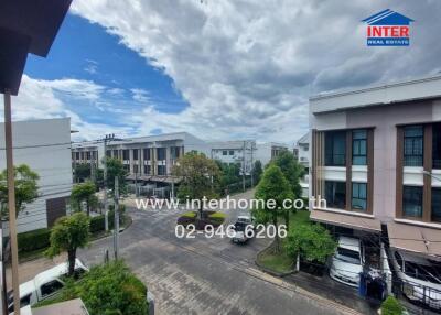 View of a residential area with modern buildings and greenery