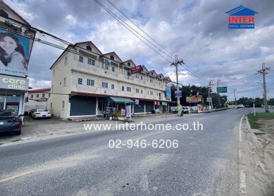 Exterior view of a commercial building on a street