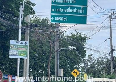 Street view near the property with real estate signage