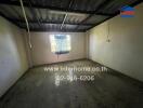 Empty room with concrete floor and window