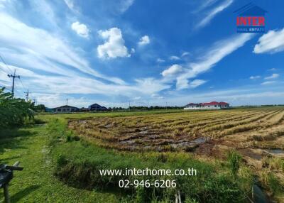 Scenic view of open field with clear blue sky