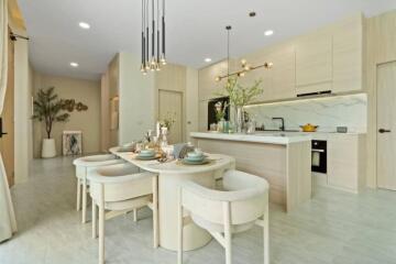 Modern dining area with an open kitchen