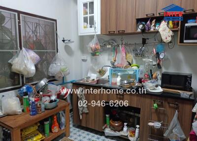 A fully equipped kitchen with various utensils and appliances