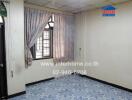 Empty room with curtains, tiled floor, and window