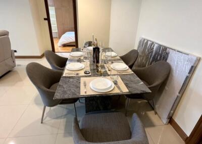 Contemporary dining room with a set dining table and six chairs