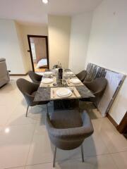 Contemporary dining room with a set dining table and six chairs