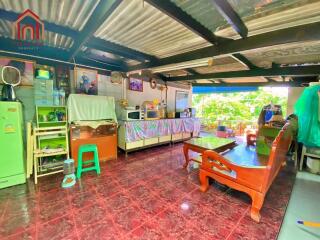 Cozy kitchen and dining area with appliances and seating