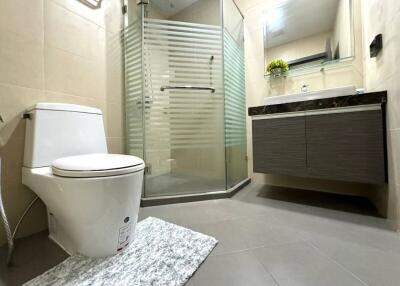 Modern bathroom with glass shower and vanity