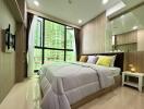 Modern bedroom with large window and urban view