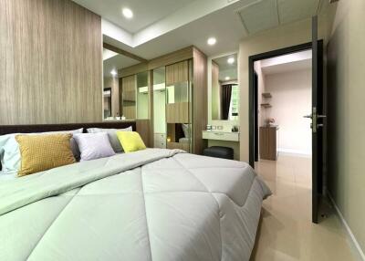 Modern bedroom with wardrobe and ensuite bathroom