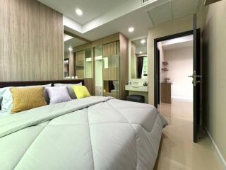 Modern bedroom with wardrobe and ensuite bathroom