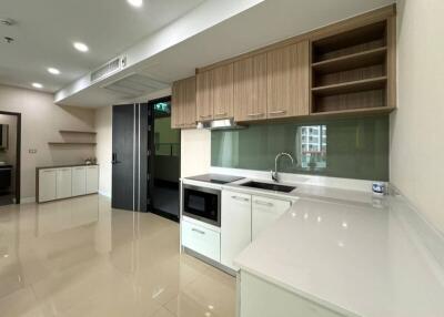 Modern kitchen with appliances and ample storage