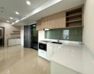 Modern kitchen with appliances and ample storage