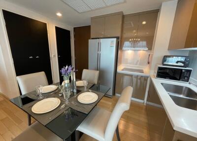 Modern kitchen and dining area with table setup