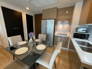 Modern kitchen and dining area with table setup