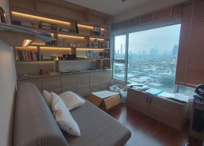 Modern home office with large window and city view