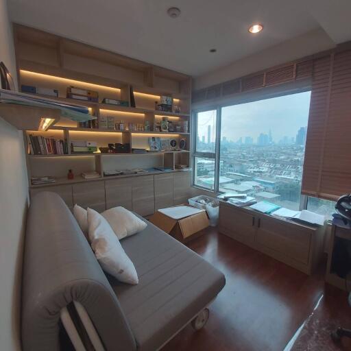 Modern home office with large window and city view