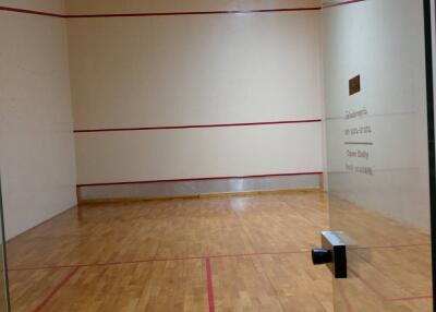 Squash court with wooden flooring