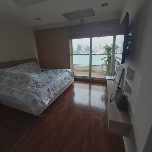 Bedroom with balcony view