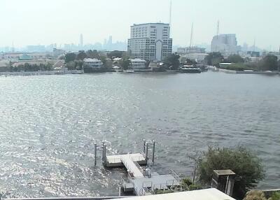 View of river and city skyline from a property