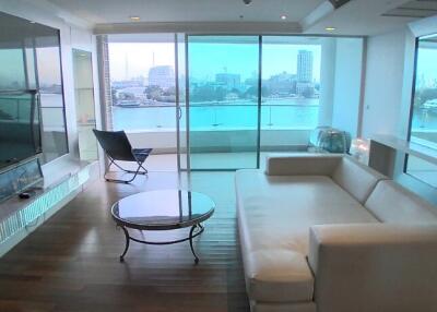 Modern living room with a city view and large windows