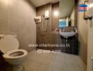 Modern bathroom with tiled walls and fixtures