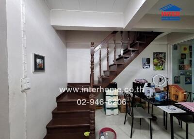 Staircase in a room with furniture