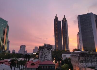 Cityscape view with buildings at sunset