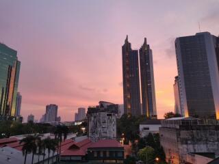 Cityscape view with buildings at sunset