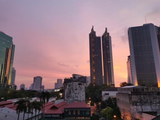 Cityscape view with buildings at sunset