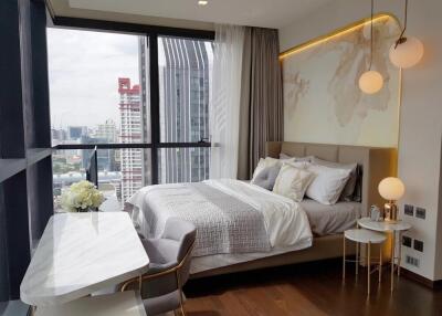 Modern bedroom with large windows and stylish decor