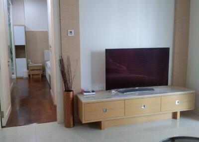 Modern living room with TV and wooden cabinet