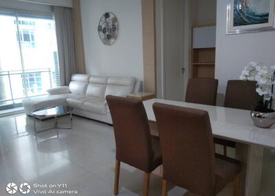 Modern living room with dining area and white sofa